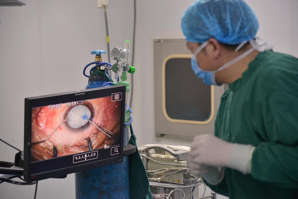 Ophthalmic surgeon performing advanced laser vision correction in a futuristic clinic