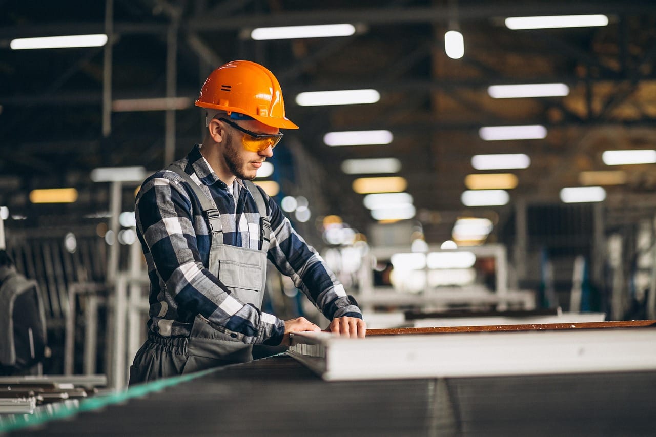Industrial worker wearing glasses for workplace eye safety.