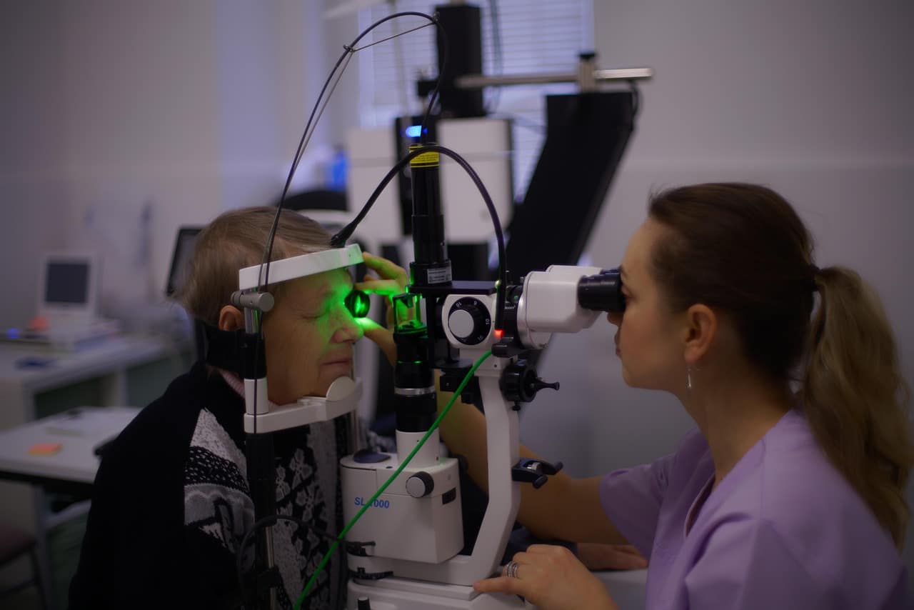 Professional eye exam frequency check-up for a patient at a clinic.